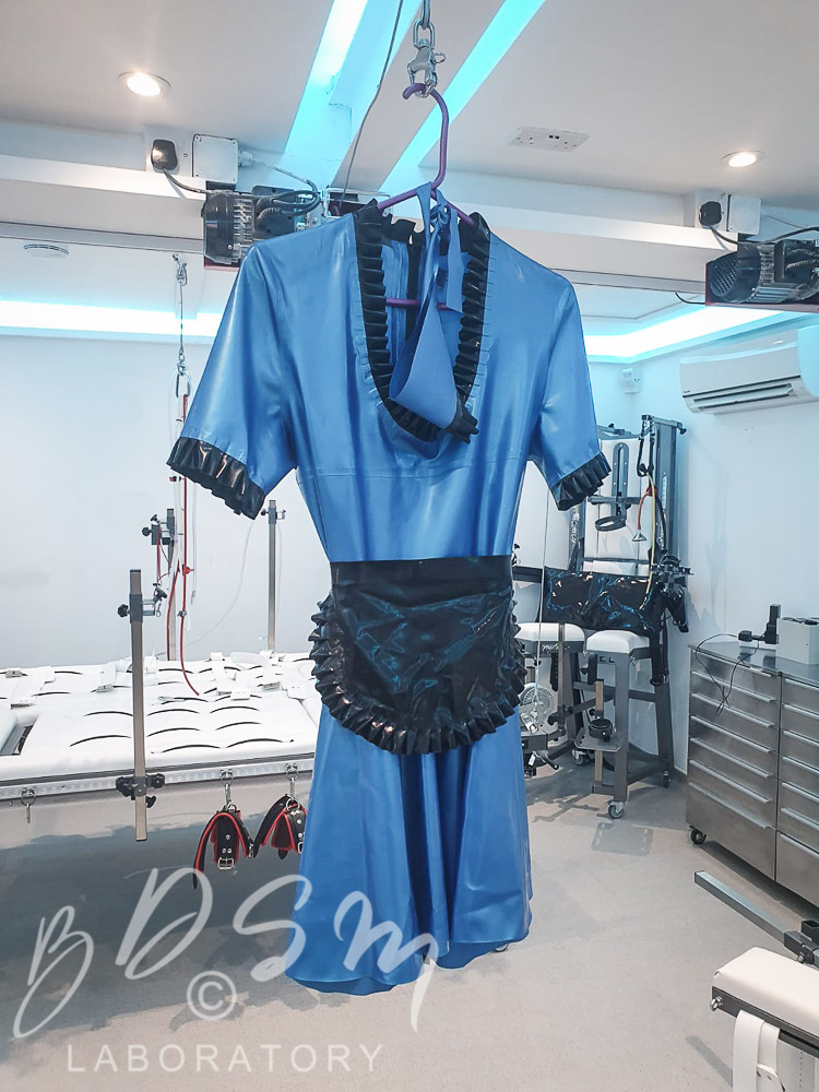 Rubber Bondage Heaven 4 Rubber maid outfit hanging in the BDSM Laboratory