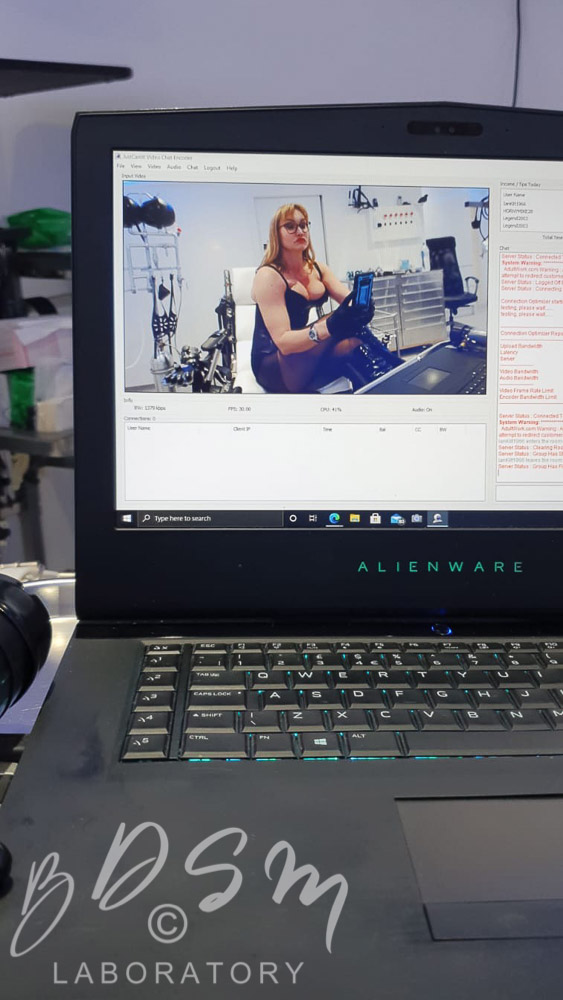 Kinky Webcam BDSM play with Mistress Miranda 3 Open laptop during a BDSM webcam session with Mistress Miranda