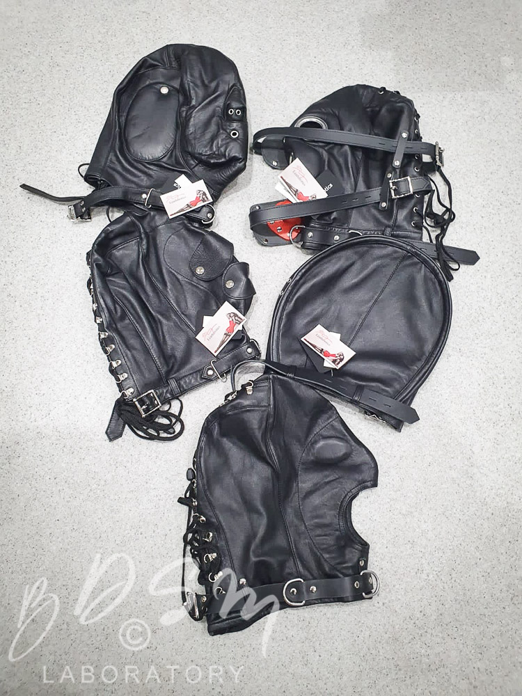 Selection of leather BDSM bondage hoods