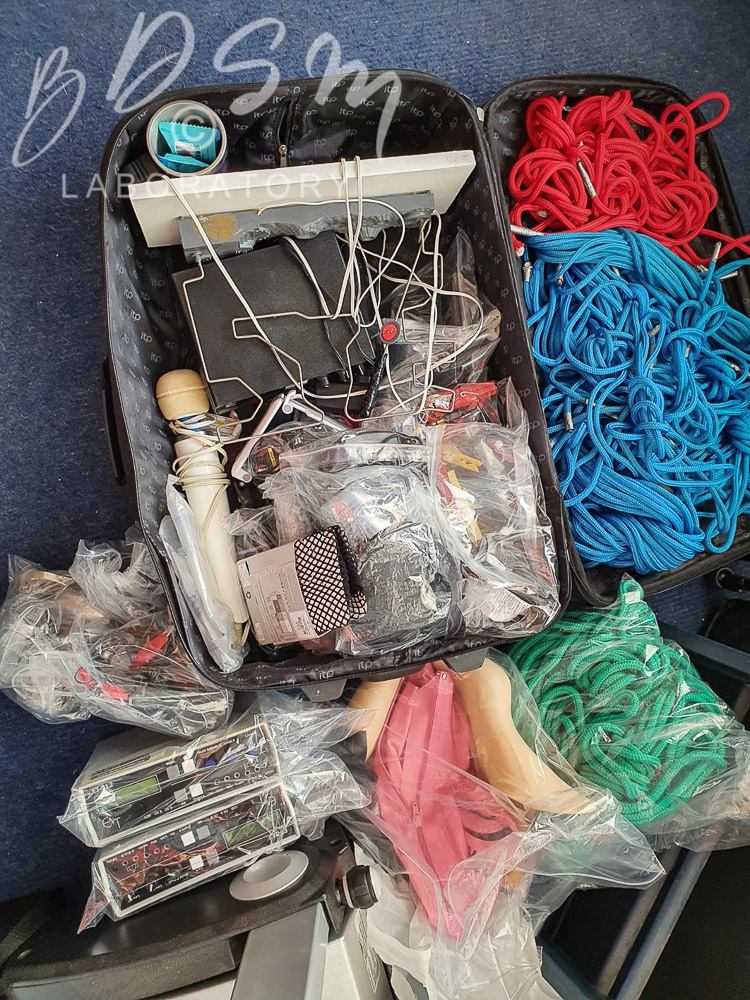 fetish paraphernalia and a Mackintosh coat in my luggage