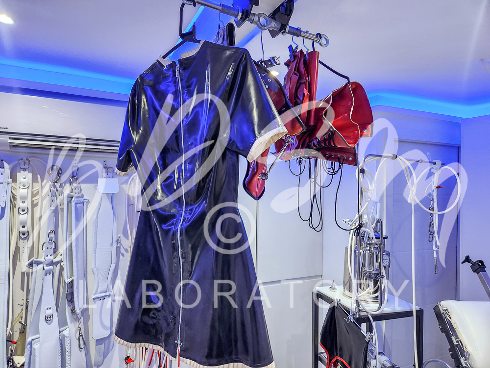 Feminising rubber uniforms at the BDSM Laboratory