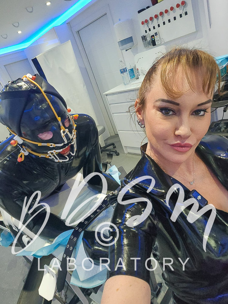 Mistress Miranda and sub with face-hugger bondage