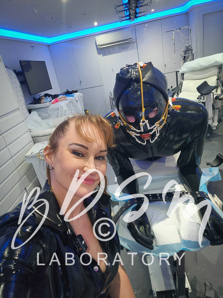 Mistress Miranda and sub with face-hugger bondage