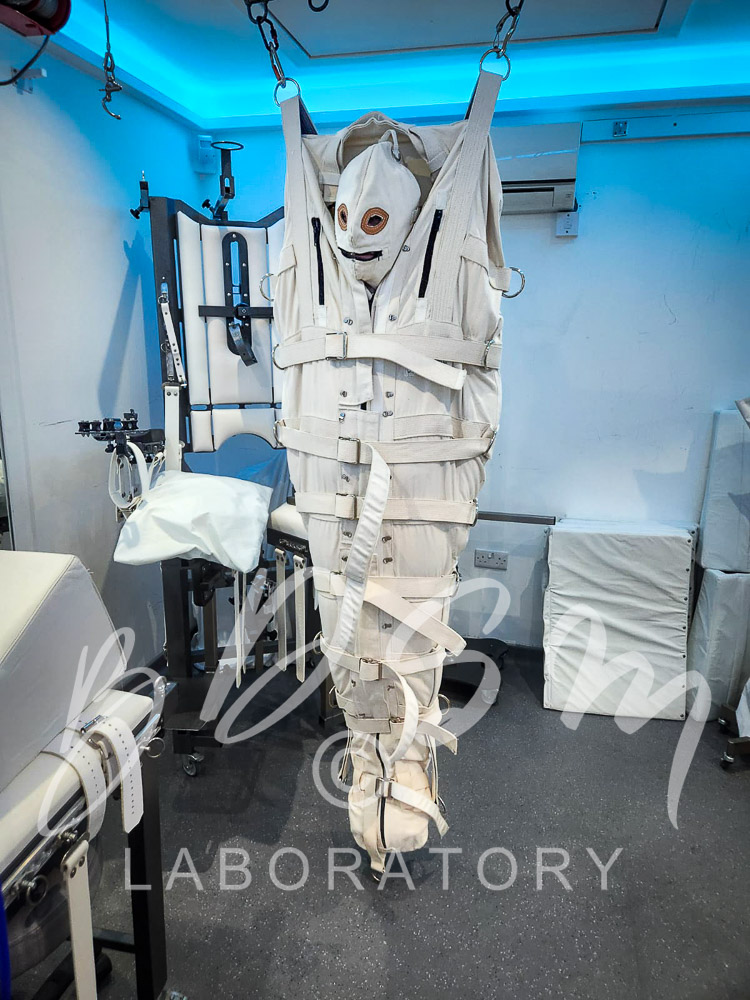 Slave in suspension at the BDSM Laboratory